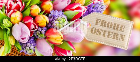 Springtime flowers and German Happy Easter Stock Photo