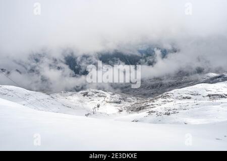 Zugspitze, Germany - Aug 5, 2020: Sonnenkar cable car for ski field in summer snow Stock Photo