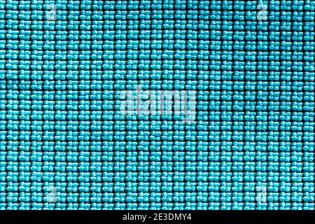 Abstract green and black synthetic fabric linen. Detail of canvas textile material texture and background. Stock Photo