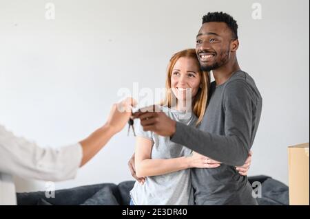 family, couple, relocation, mixed race, estate Stock Photo