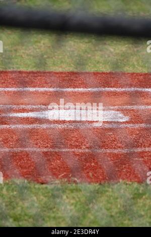 Close up of home plate in an empty baseball field Stock Photo