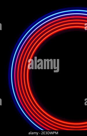 red-blue light circles on a black background Stock Photo