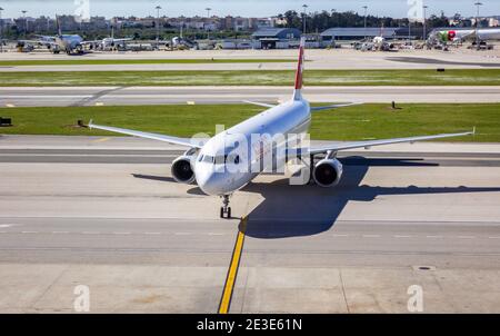 Swiss Airbus A321-111 Call Sign HB-IOH Taxiing To The Passenger Gate At Lisbon International Airport (Humberto Delgado Airport) Stock Photo