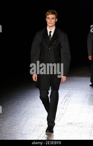 A model displays a creation by designer Raf Simons for Dior Fall-Winter ...
