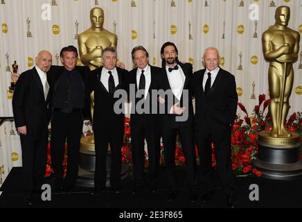 Adrien Brody, left, winner of the award for best performance by an ...