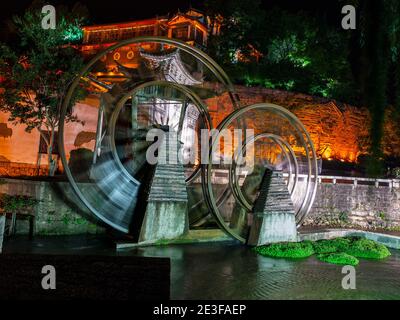 Old water mill in Lijiang, Yunnan Province, China Stock Photo