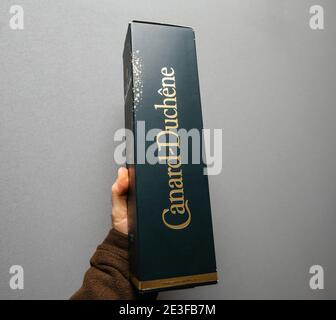 Paris, France - Dec 1, 2017: Male hand holding against bathroom tiles  bootle of Starwax wooden floor cleaning solution from 100 percent bio  organic ingredients Stock Photo - Alamy