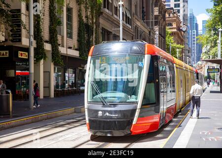 Sydney light rail train travelling along George Street in Sydney city centre,NSW,Australia Stock Photo