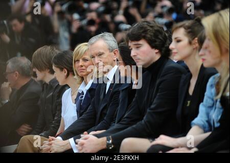 Milla Jovovich and Helene Arnault attending the Louis Vuitton Fall-Winter  2009-2010 ready-to-wear collection show by Designer Marc Jacobs in Paris,  France on March 12, 2009. Photo by Thierry Orban/ABACAPRESS.COM Stock Photo  