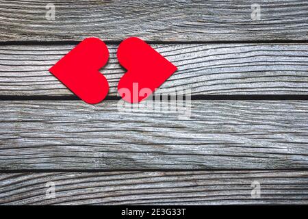 Two red hearts kissing on wooden background Stock Photo