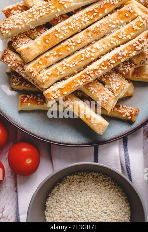 salty sesame bread sticks traditional homemade baked snacks on the table - top view close up healthy vegan or vegetarian food concept with copy space Stock Photo