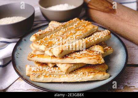 salty sesame bread sticks traditional homemade baked snacks on the table - close up healthy vegan or vegetarian food concept Stock Photo