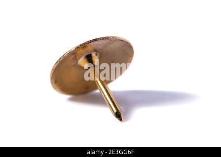Closeup metal tack isolated on a white background. Office concept Stock Photo
