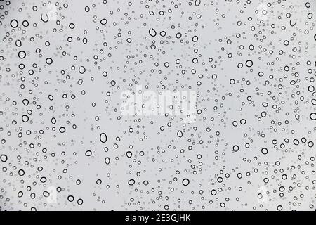 Rain drops on window glasses texture background Stock Photo