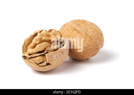 Walnuts isolated on white. Walnut in a nutshell Stock Photo