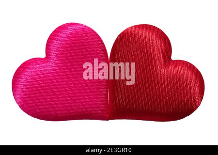 two red small hearts next to each other isolated on white background Stock Photo
