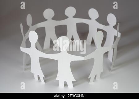paper people shape cut, connection chain Stock Photo