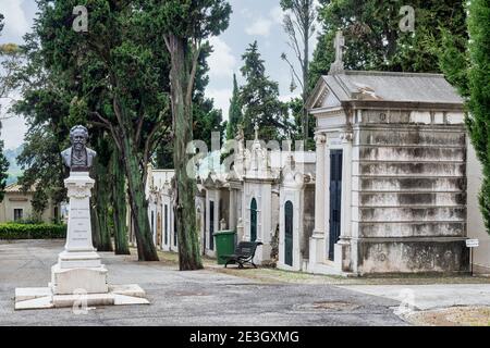 Crypts and details of the family tombs on the old city cemetery Cemiterio dos Prazeres in Lisbon, Portugal in Europe Stock Photo