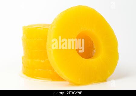 Pineapple slices on white background Stock Photo