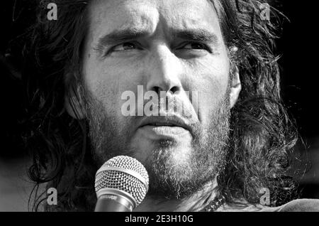 Russell Brand, comedian, speaking at The People's Assembly demonstration against Austerity, Parliament Square, London, 21st June 2014 Stock Photo