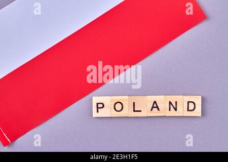 Poland written with wooden blocks. Stock Photo