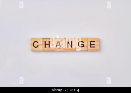Change written with wooden blocks. Stock Photo