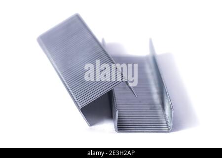Blue stapler and staples Isolated on white background. Stock Photo