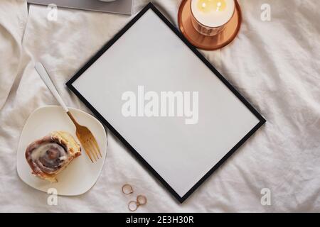 Empty frame with place for text and on the bed Stock Photo