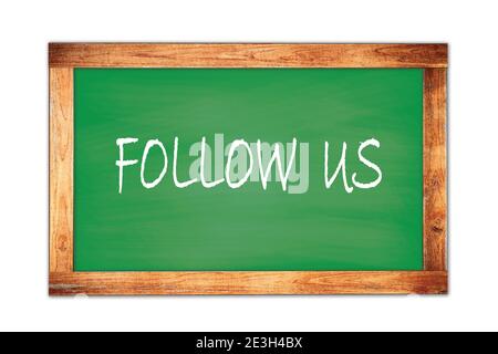 FOLLOW  US text written on green wooden frame school blackboard. Stock Photo