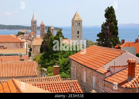 view over the terracotta tiles roofs of the upper town in  Rab town, Rab Island Croatia. Stock Photo