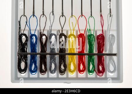 Sewing kit, sewing thread and sewing needles, already threaded, different colours, ready to sew, hotel amenities, Stock Photo