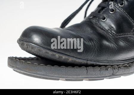 Shoe, with detached sole, Stock Photo