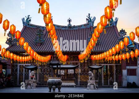 Kuan Yin Teng temple decorated with red lanterns during the Chinese (or Lunar) New Year in George Town, Penang, Malaysia. Stock Photo