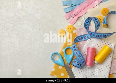 Sewing supplies on white background, space for text Stock Photo