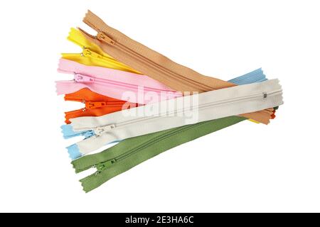 Color zippers isolated on white background, top view Stock Photo