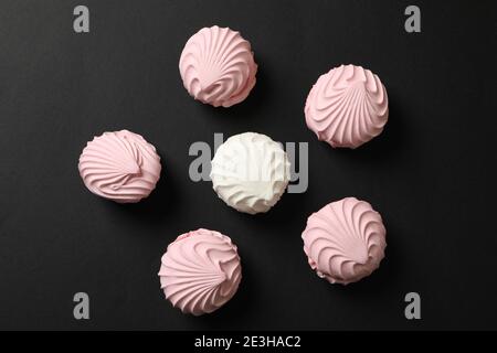 Sweet marshmallow on black background, top view Stock Photo
