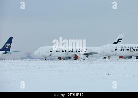 Prague, Czech Republic - January 18, 2021: Finnair airplanes  grounded and stored due global coronavirus crisis at Prague Airport. Stock Photo