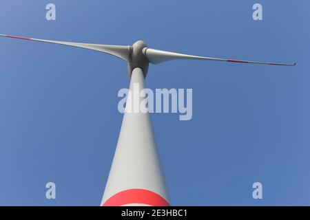 Wind turbine view from below .Windmill wind farm and green electricity power generator.Eco energy concept. Stock Photo