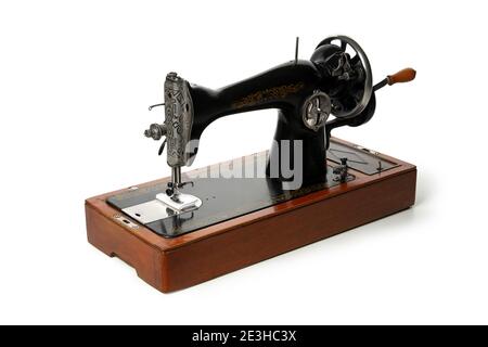 Old vintage sewing machine isolated on white background Stock Photo