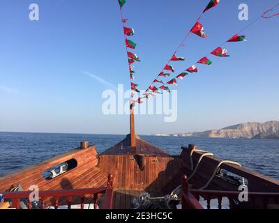Sunset Cruise on a traditional Dhow, Muscat, Sultanate of Oman Stock Photo