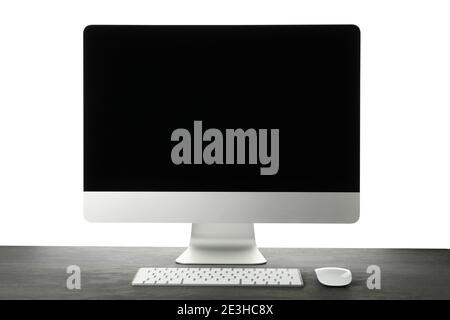 Computer, keyboard and mouse on wooden table isolated on white background Stock Photo