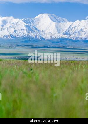 Mount Pik Dserschinski. Alaj valley in front of the Trans - Allay mountain range inthe Pamir mountains. Asia, Central Asia, Kyrgyzstan Stock Photo
