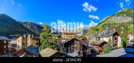 Panoramic view over Zermatt with the the iconic Matterhorn mountain shrouded in white clouds, Valais (Wallis), Switzwerland Stock Photo