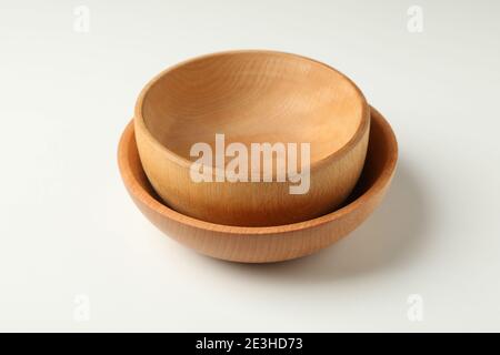 Two wooden bowls on white background, close up Stock Photo