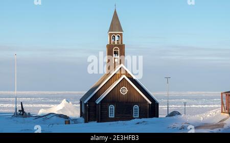 Zions Church, a landmark of Ilulissat. Winter in Ilulissat on the shore of Disko Bay.  America, North America, Greenland, Denmark Stock Photo