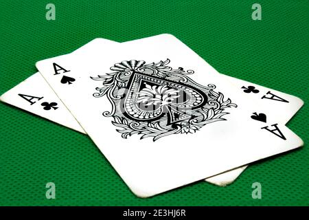 Two aces on green poker table Stock Photo