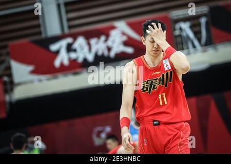 201211) -- ZHUJI(ZHEJIANG), Dec. 11, 2020 -- Darius Adams (L) of Qingdao  Eagles celebrates scoring