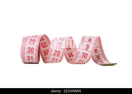 Measuring tape isolated on white background, close up Stock Photo