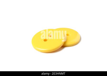 Yellow buttons isolated on white background, close up Stock Photo