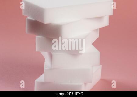 Melamine household sponge. Melamine sponges on dark background, tools for kitchen and home cleaning Stock Photo